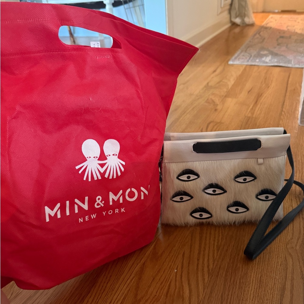 Min & Mon Cream Faux-Fur Clutch with Black Eye Motif